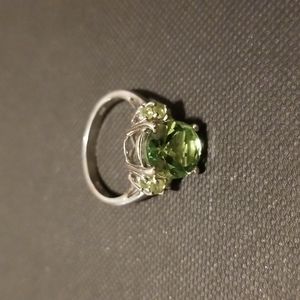 Sterling silver ring with green stones